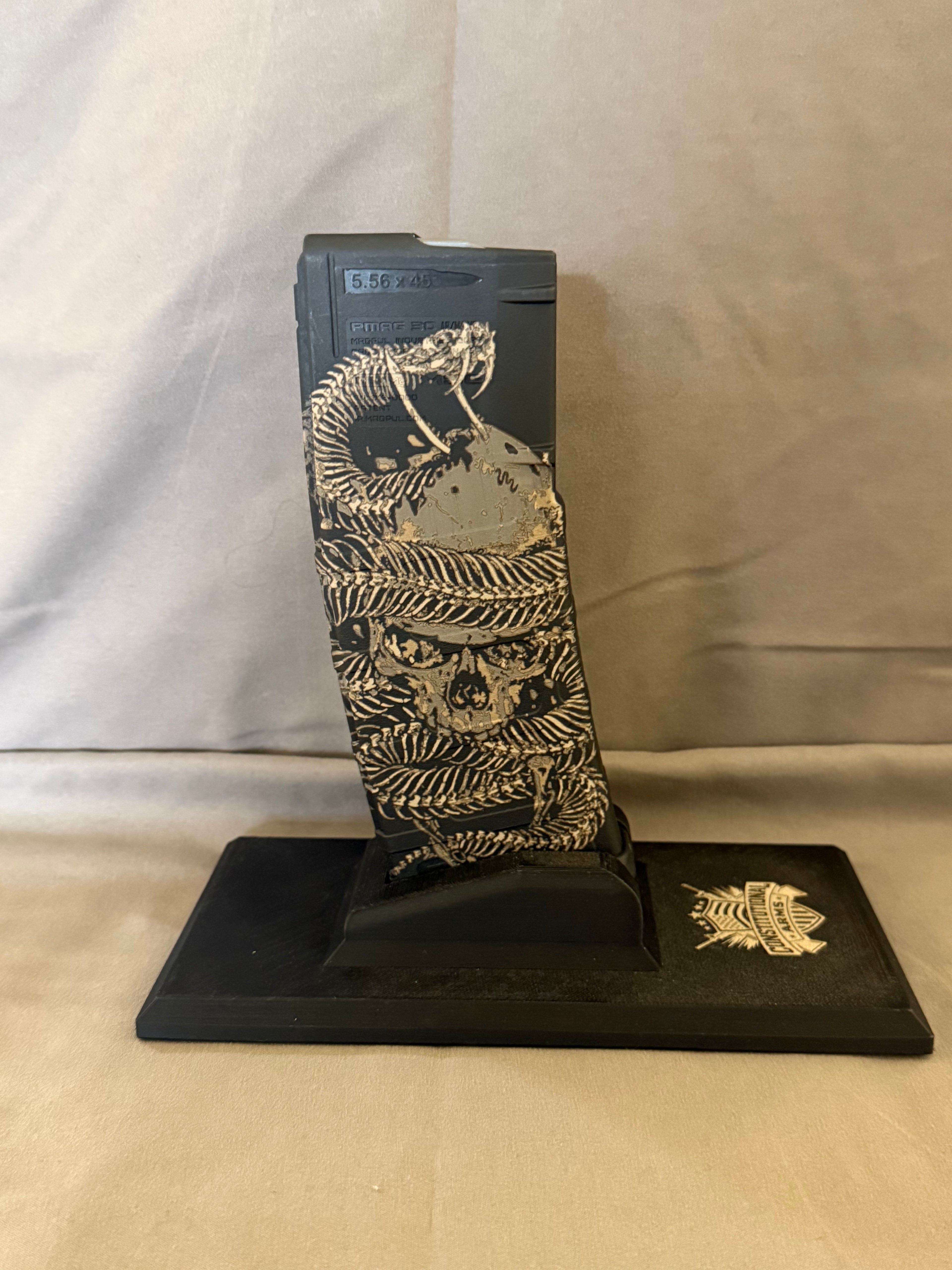 Wrapped up snake & skull